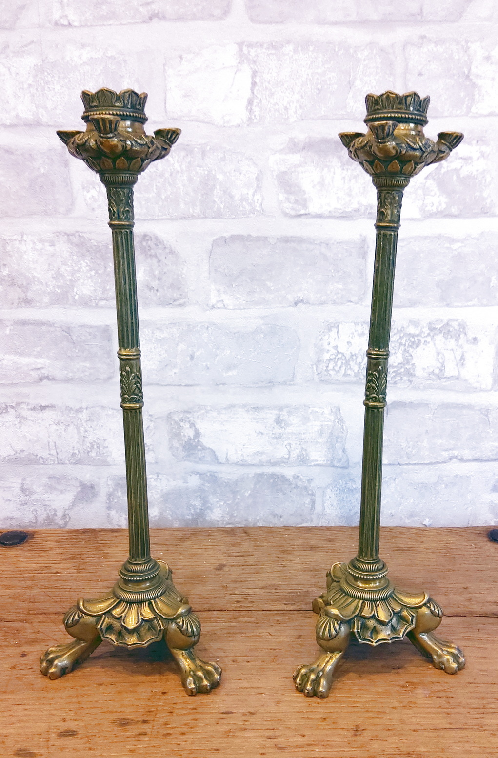 A pair of French Empire Candlesticks